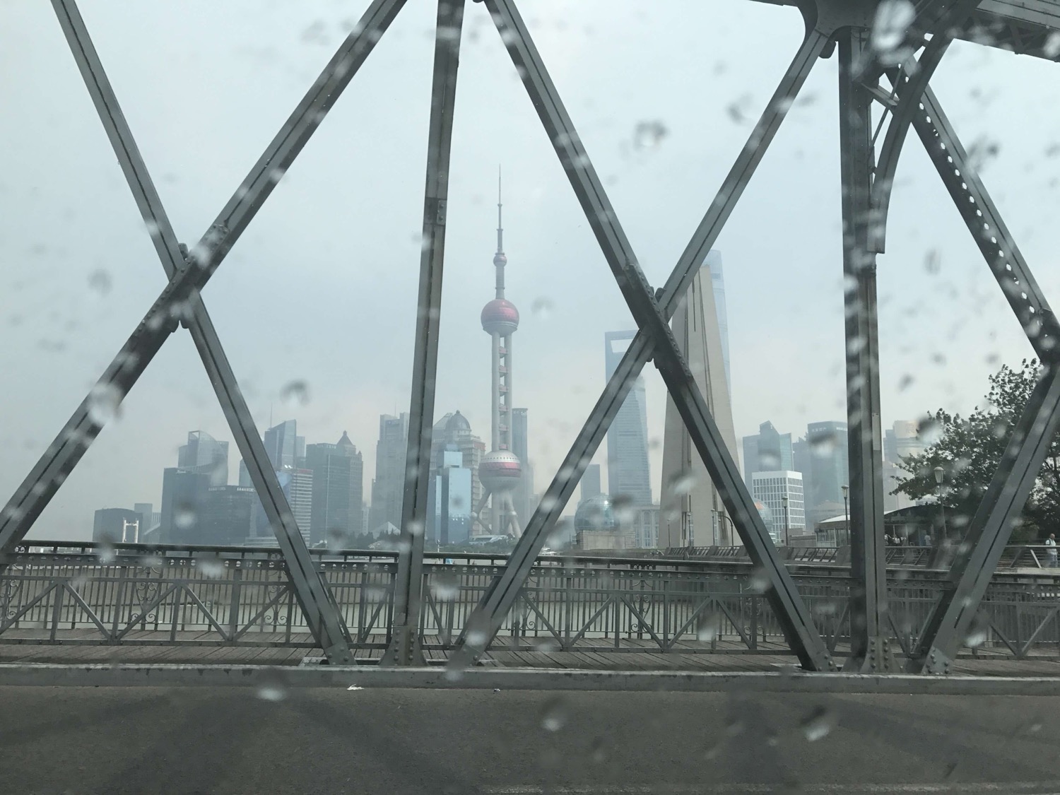 Shanghai's Pudong skyline framed by the Waibaidu Bridge